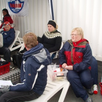 Þjálfarar og fararstjórar í forgrunni.